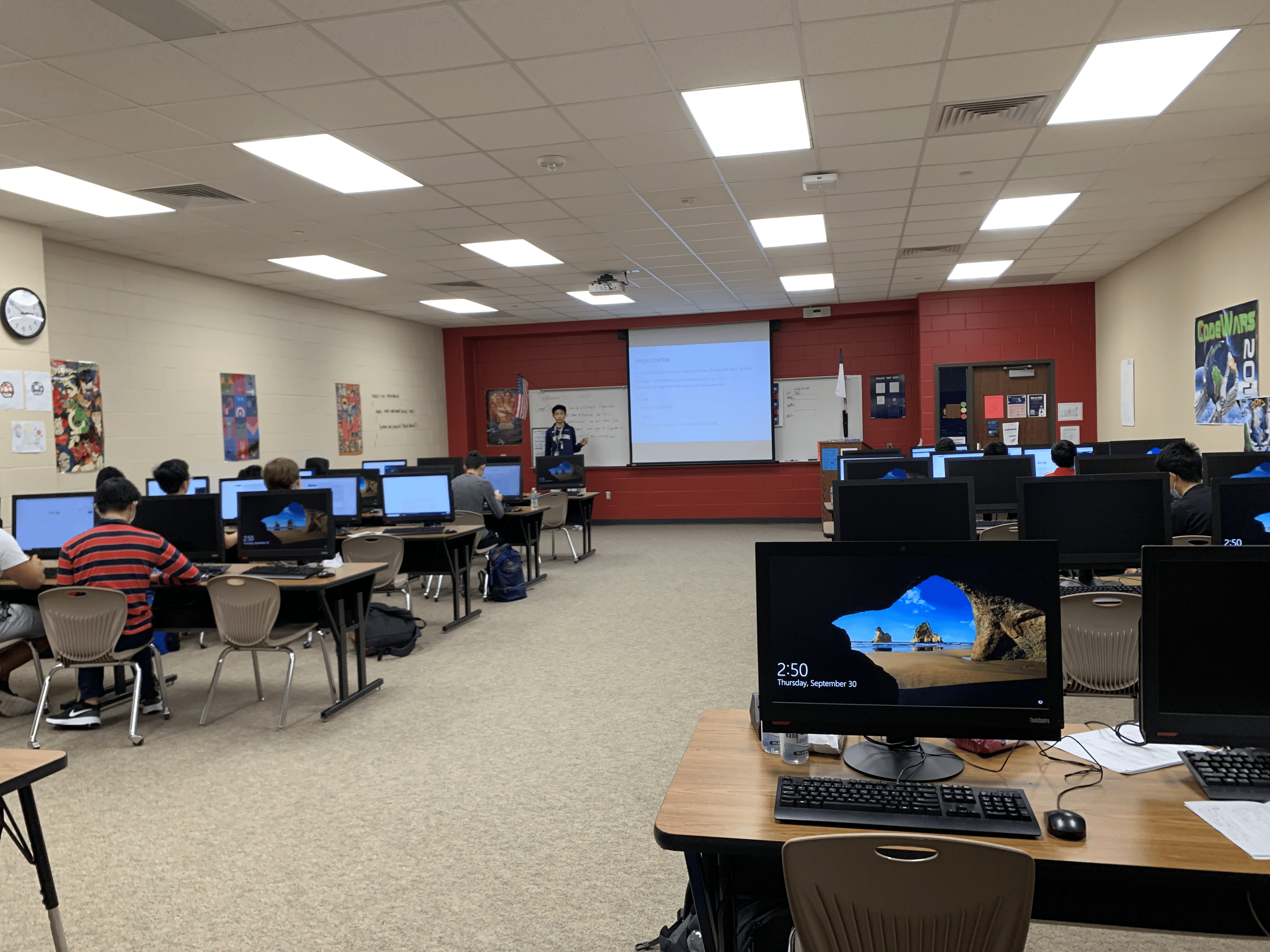 Students coding together